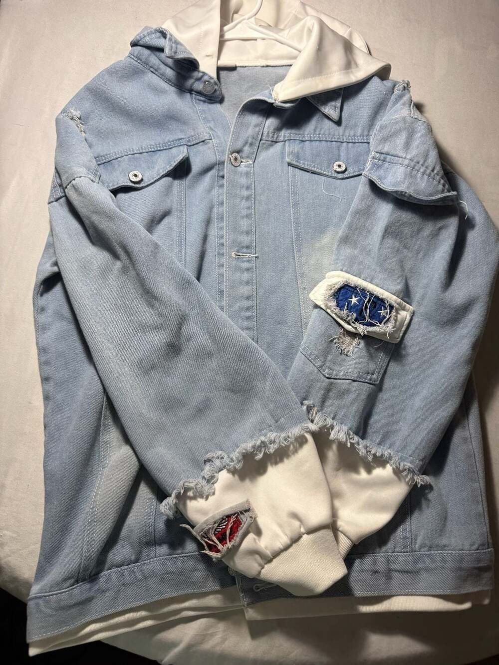 Unisex Distressed Denim Jacket with White Hood and Anime-Inspired Patches